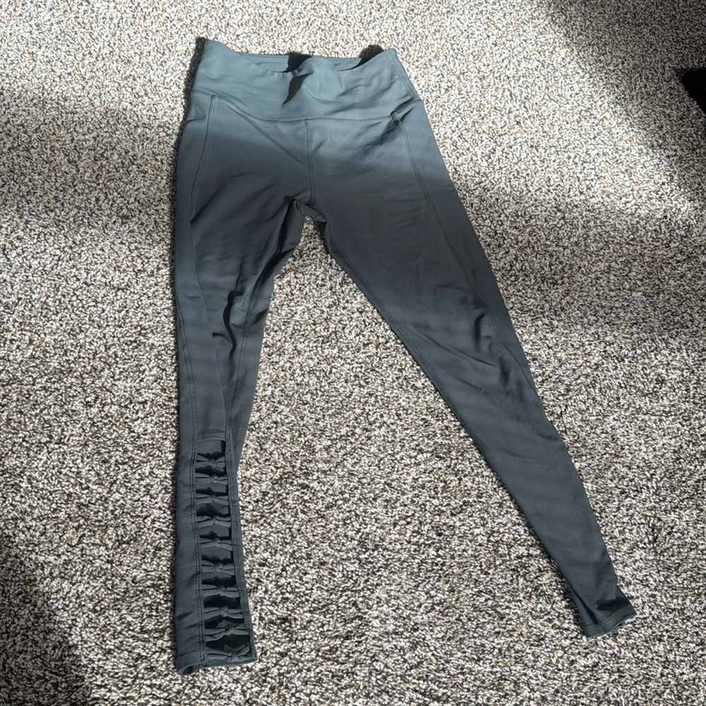 Green soul cycle leggings with side cut outs